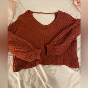 Knit rust-orange sweater